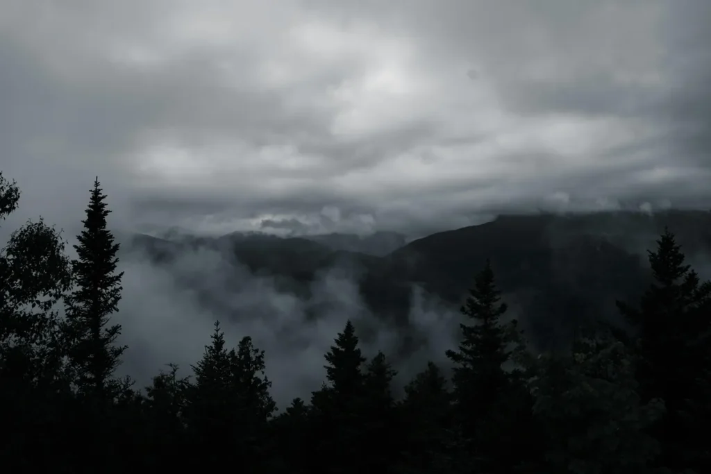 Misty hills and clouds in Nainital during monsoon season. 