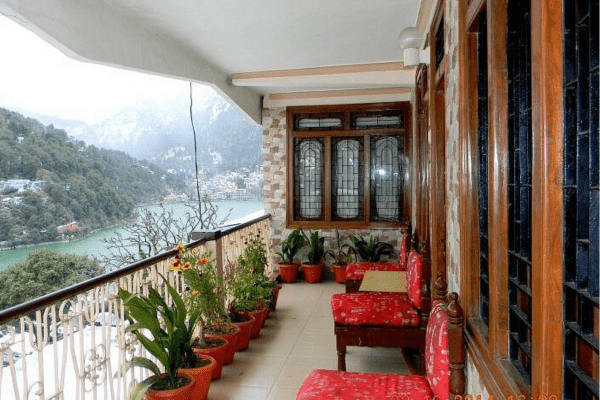 A hotel balcony or room with a direct view of Naini Lake.