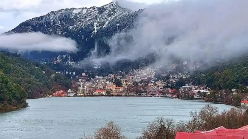 Snow-covered Naini Lake during winter season in Nainital 2025