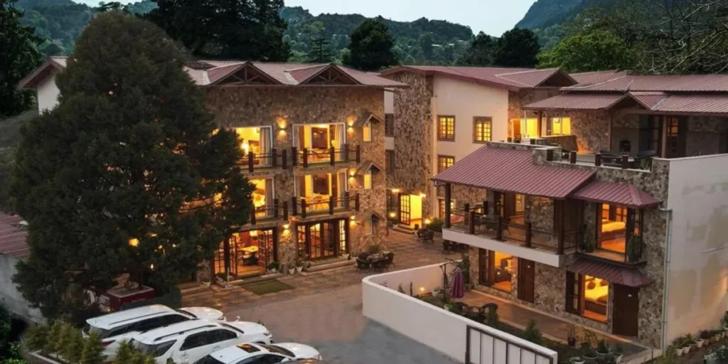 Exterior view of Hotel Shivraj Nainital with scenic Himalayan backdrop
