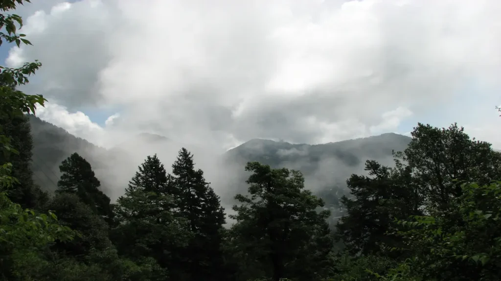 Misty monsoon clouds covering the hills of Nainital during the rainy season