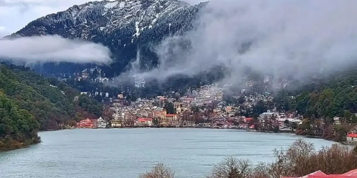 Snow-covered Naini Lake during winter season in Nainital 2025